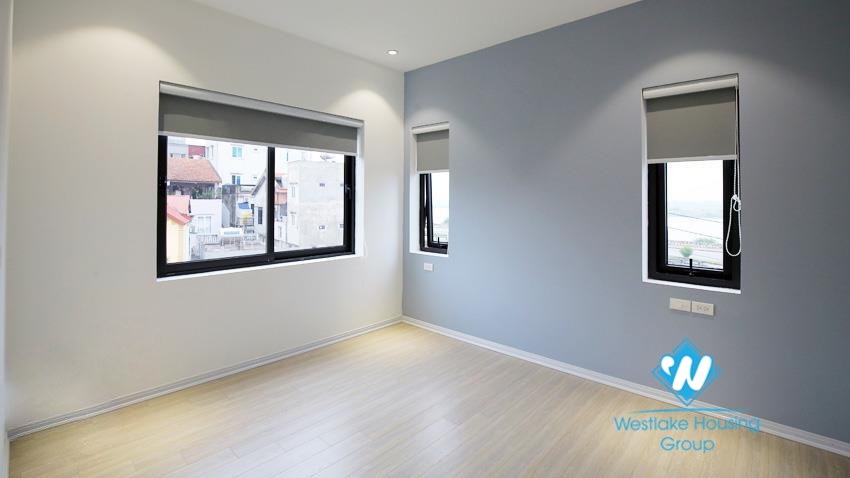 House for rent with four bedrooms and yard around the house in An Duong Vuong, Tay Ho